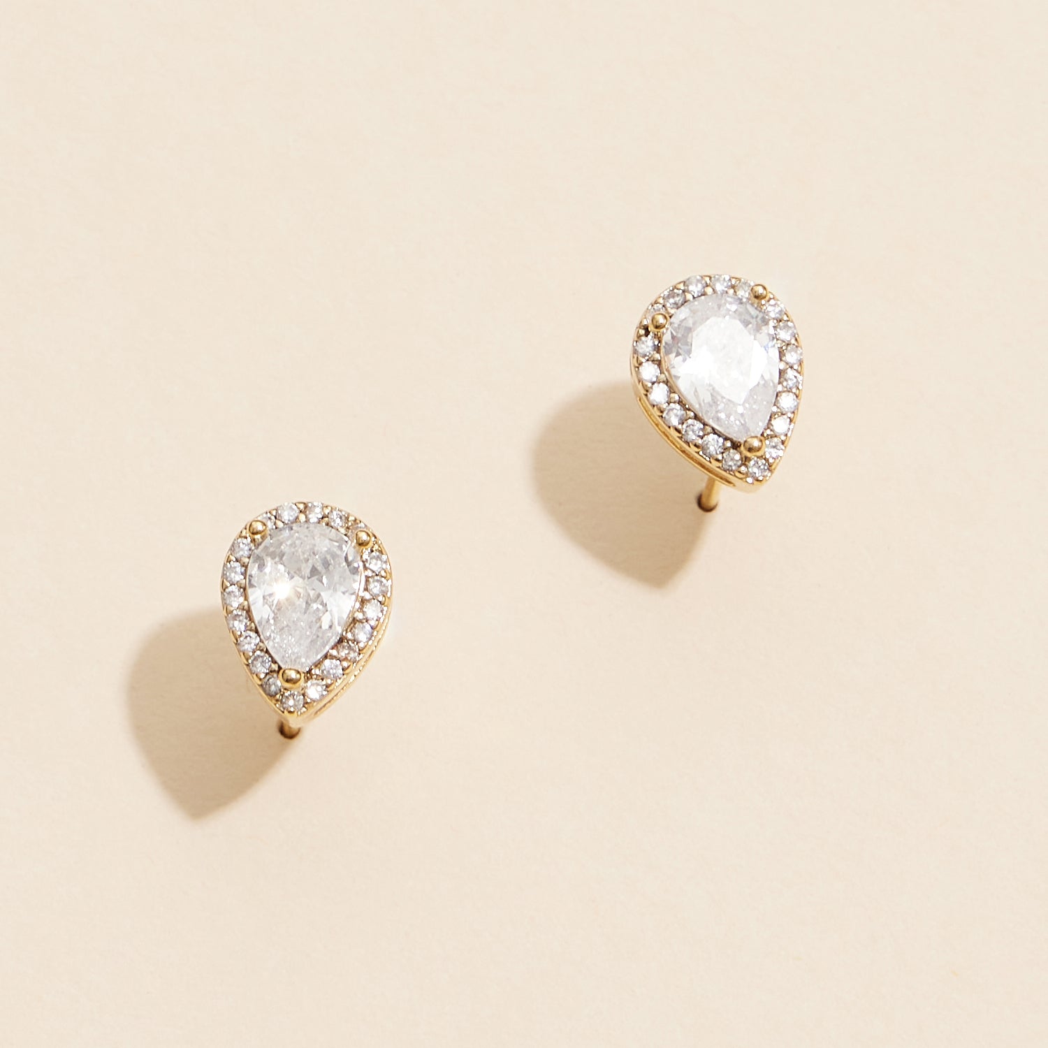 Elegant Pear-Shaped Gold Stud Earrings with Diamond Accents