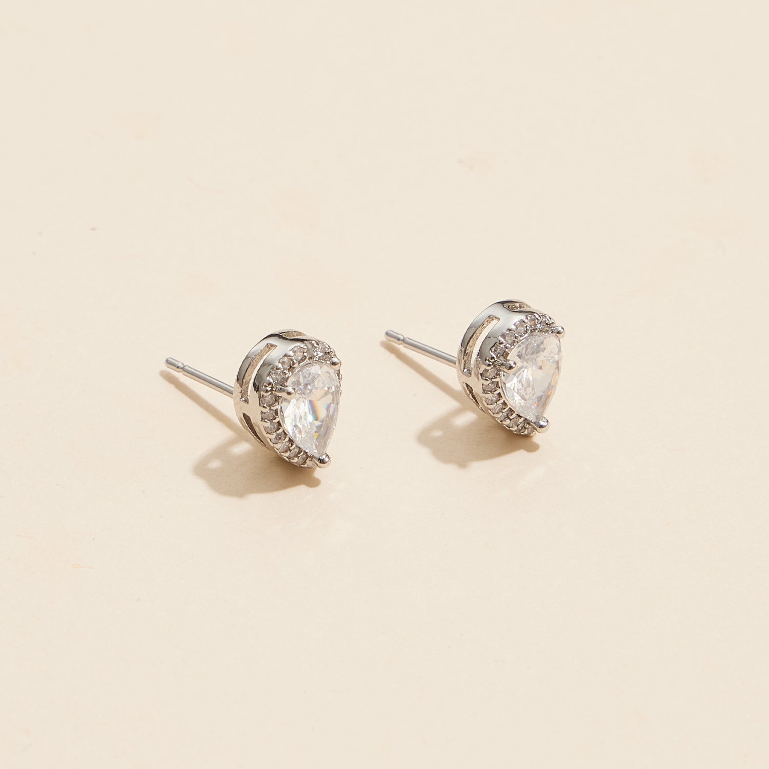 Elegant Pear-Shaped Gold Stud Earrings with Diamond Accents