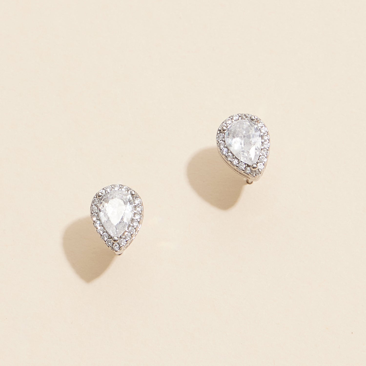 Elegant Pear-Shaped Gold Stud Earrings with Diamond Accents