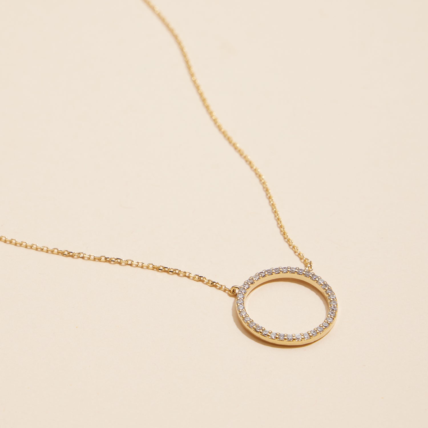 Sophisticated Gold Circle Pendant Necklace with CZ Accents