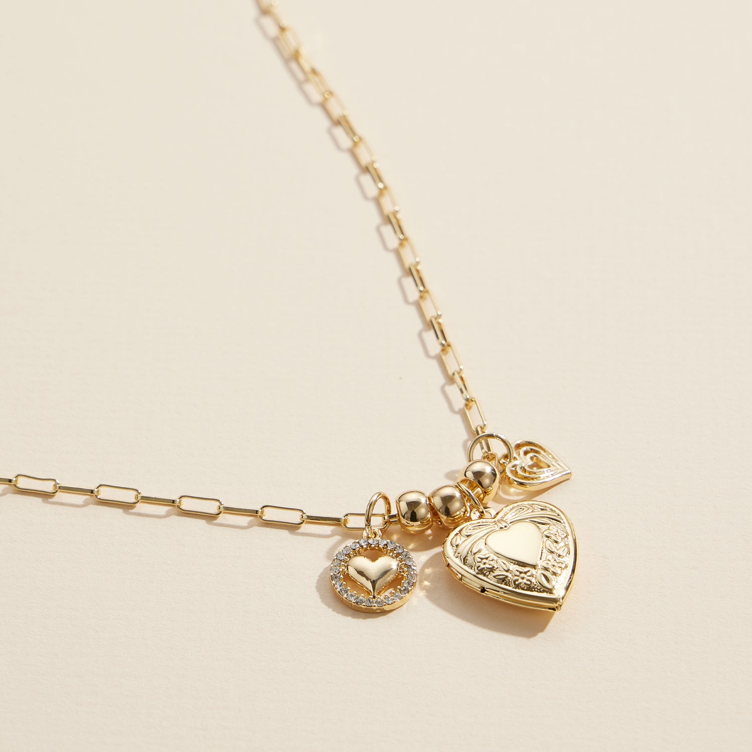 Elegant Layered Chain Necklace with Heart Charm Locket