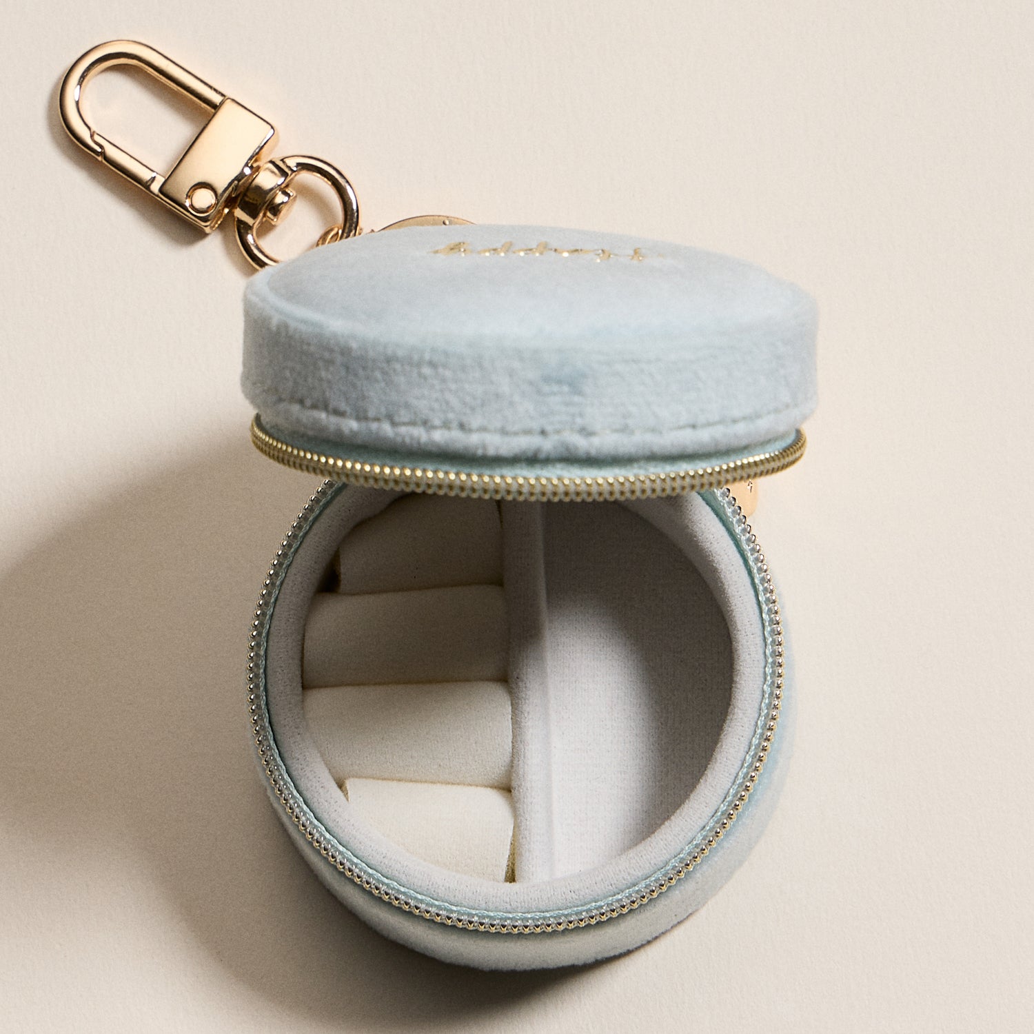 Mini Round Jewelry Travel Case with Keychain – Blue Velvet "Happy" Design