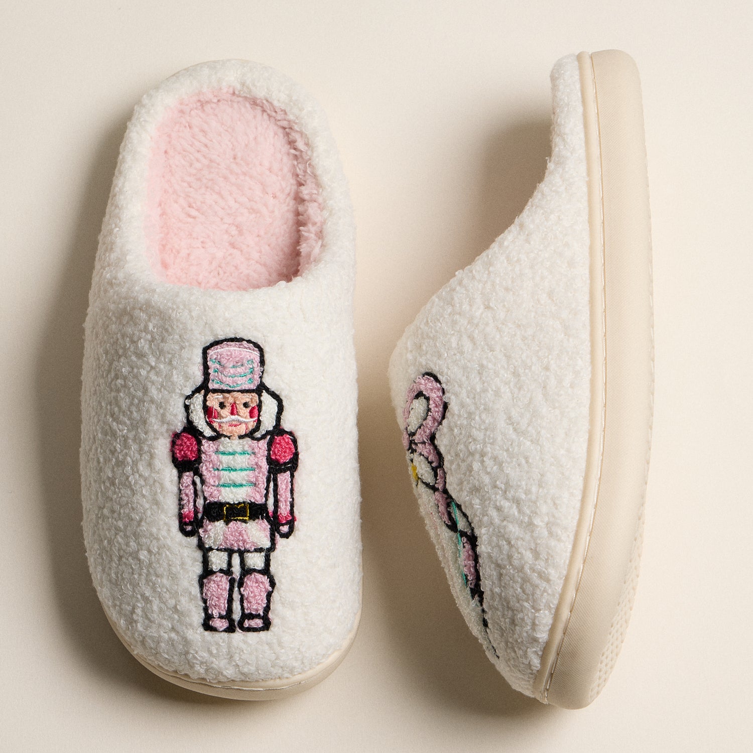 Plush Holiday Slippers Embroidered with Classic Nutcracker and Festive Ribbon Ornament