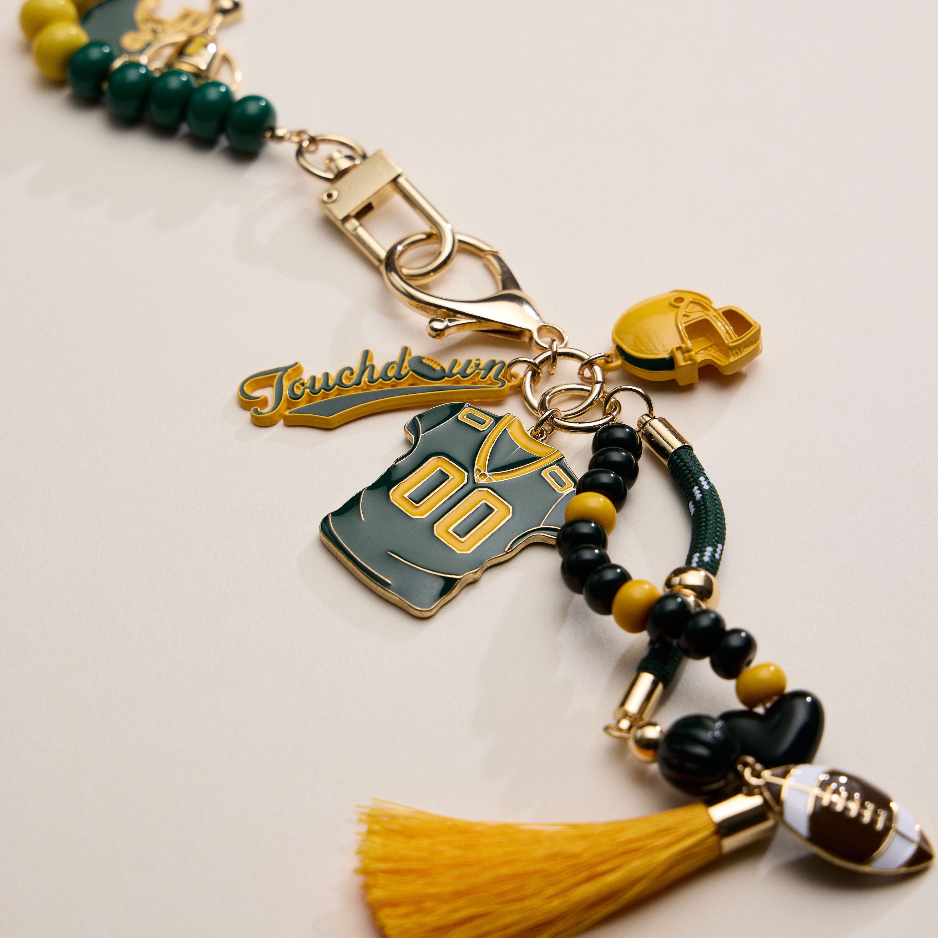 NFL Team Gameday Football Keychain – Football Jersey, Helmet, Touchdown Charm & Tassel Bag Accessory