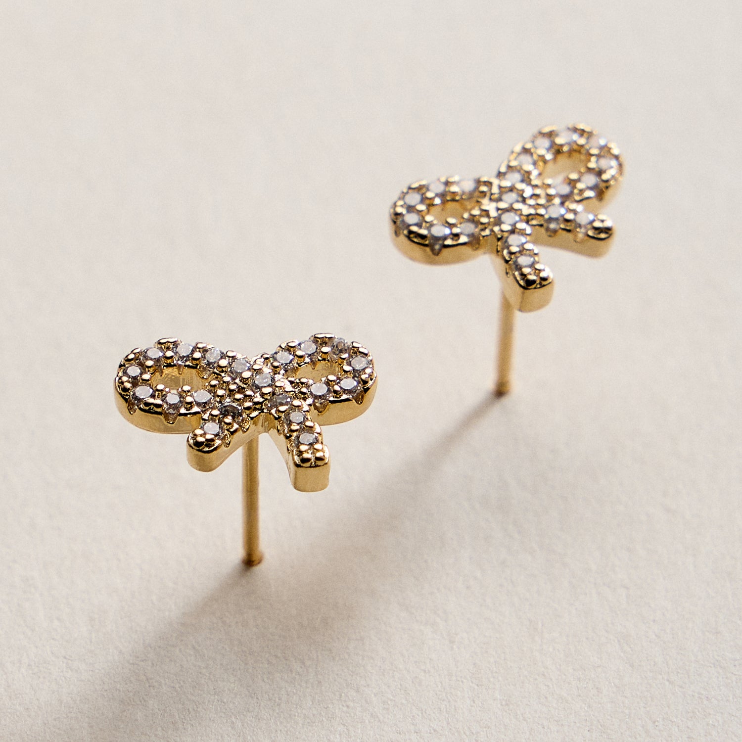 Gold Filled Bow Stud Earrings with Sparkling CZ Accents