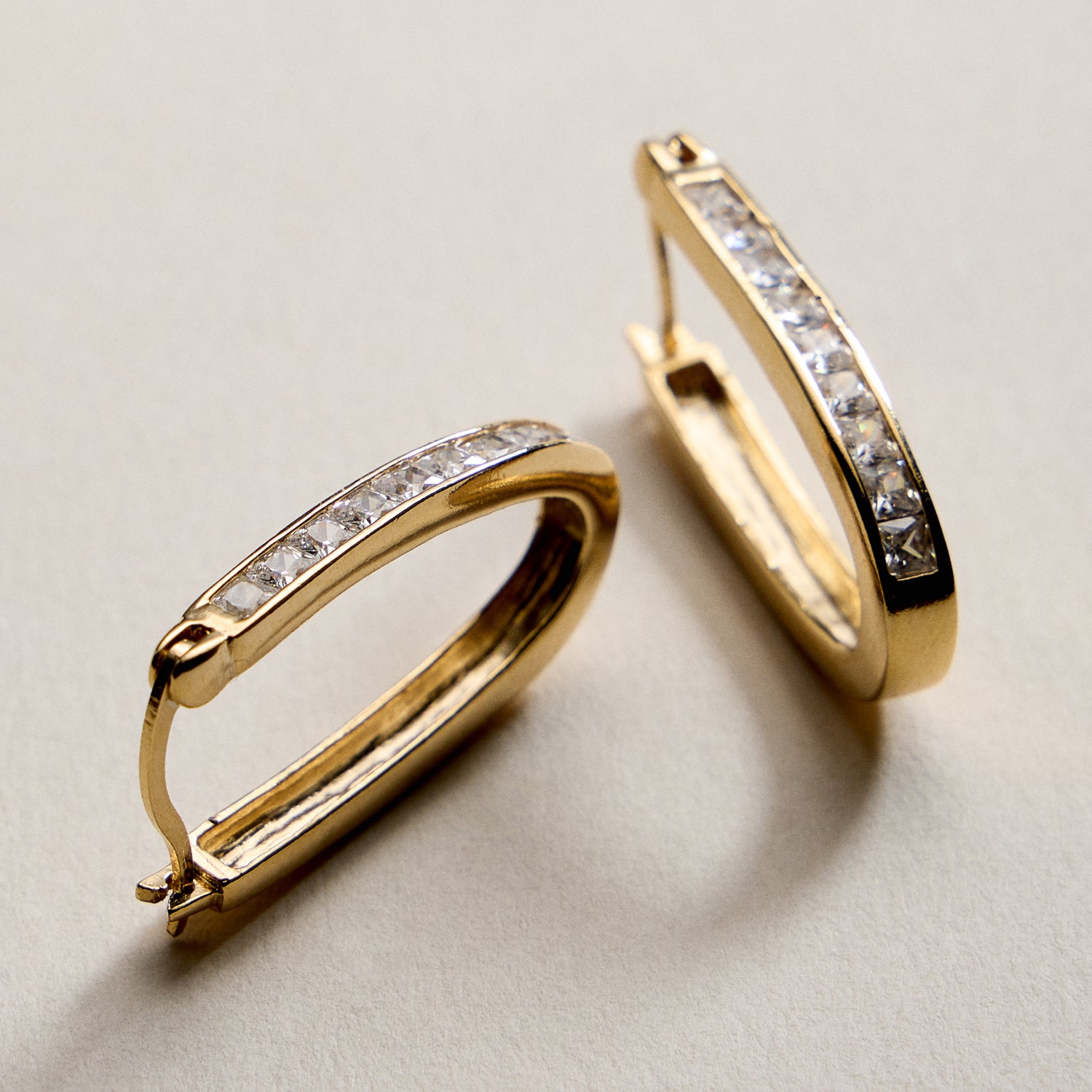 Gold Filled Oval Hoop Earrings with Channel Set CZ Stones