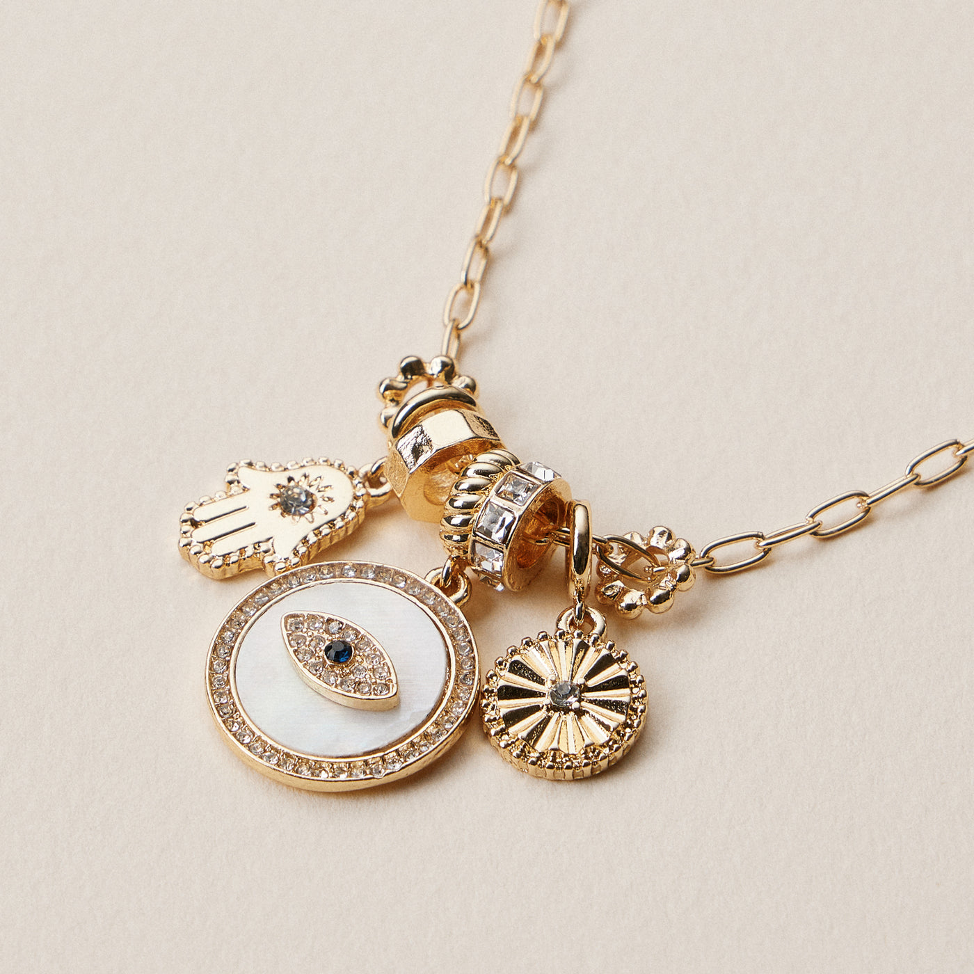 Gold Dipped Symbolic Multi Charm Necklace Collection