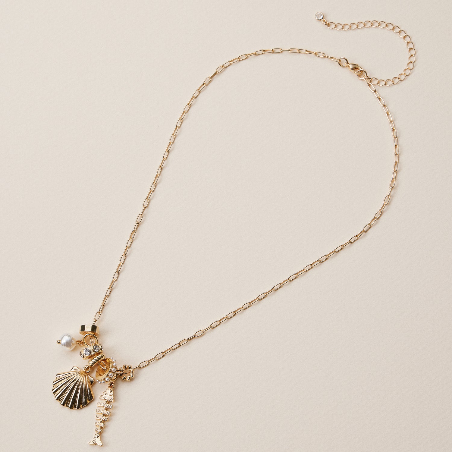 Gold Dipped Symbolic Multi Charm Necklace Collection