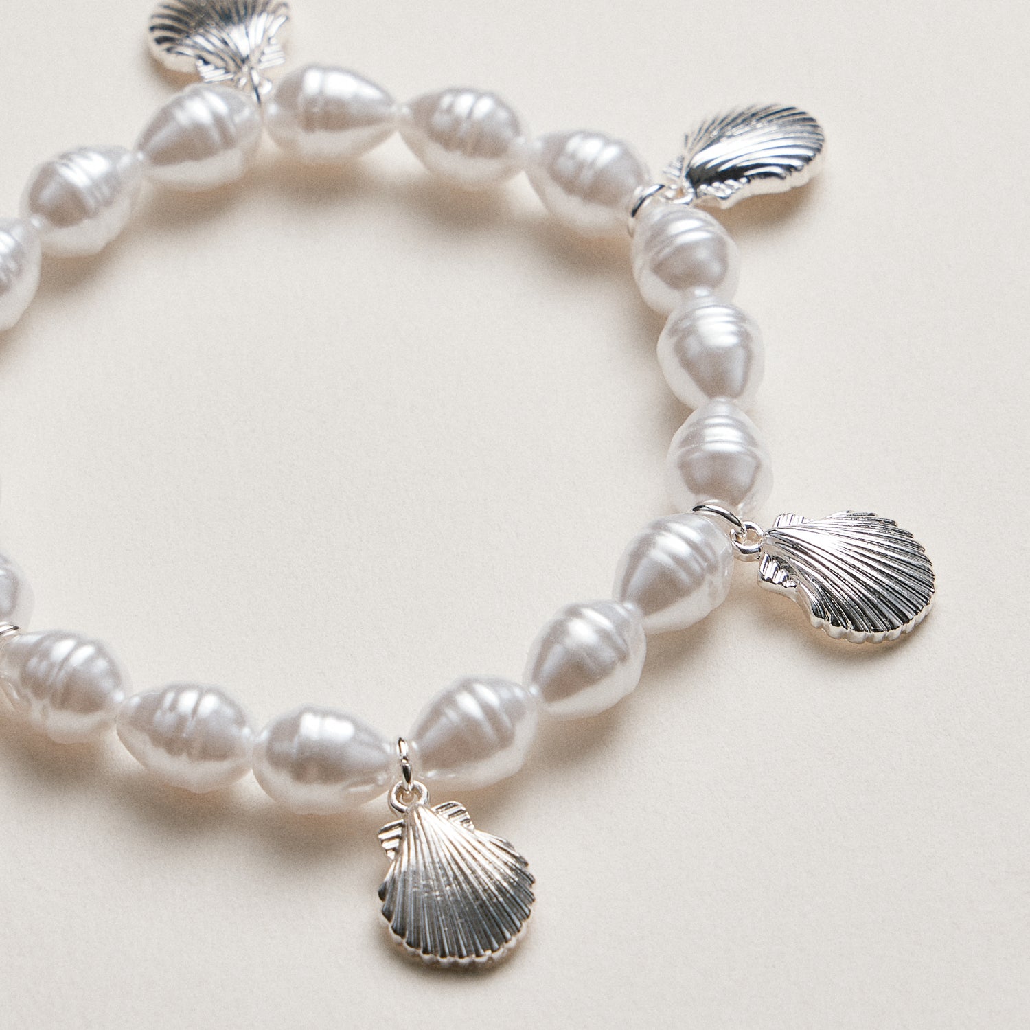 Pearl Bracelet with Gold Scallop Shell Charms