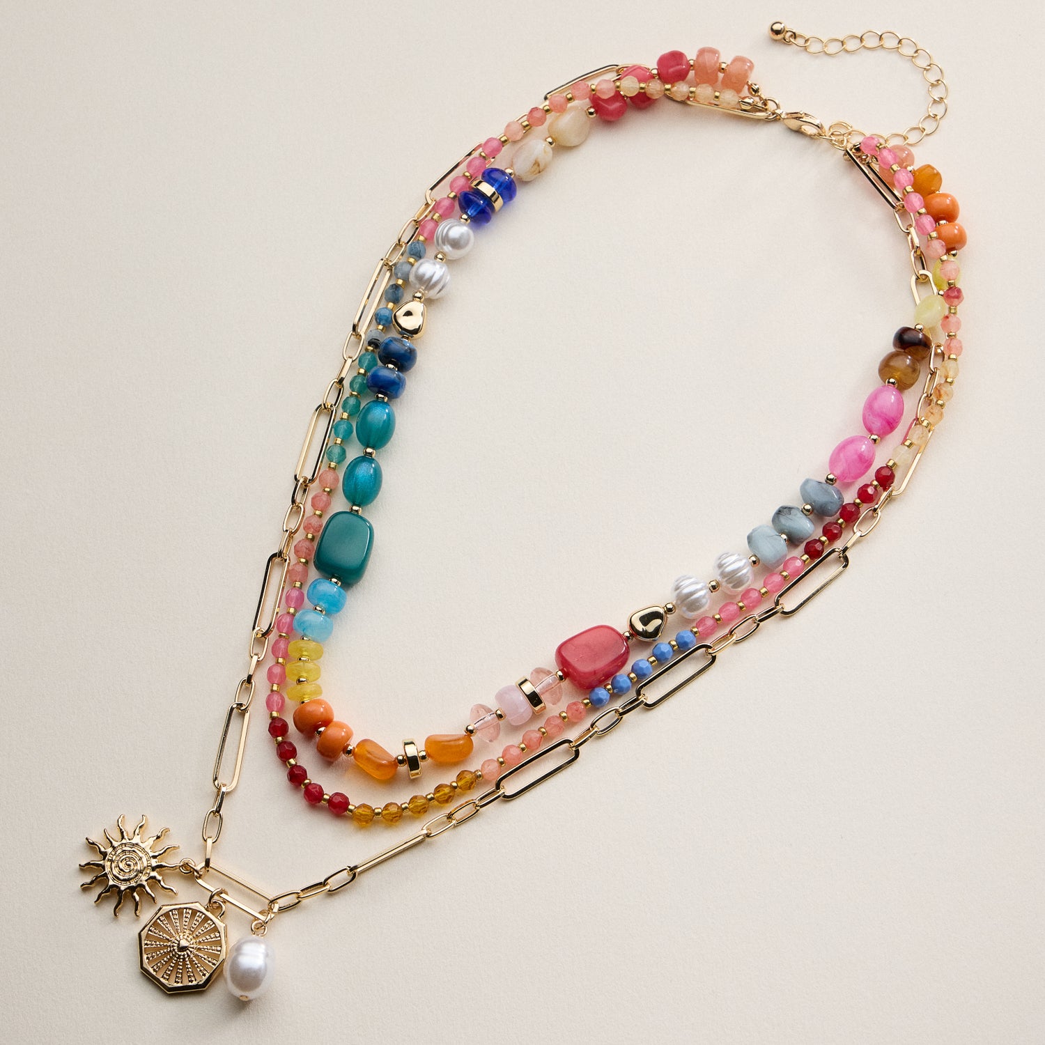 Layered Beaded and Chain Necklace with Sun and Pearl Charms – Gold Accent Design