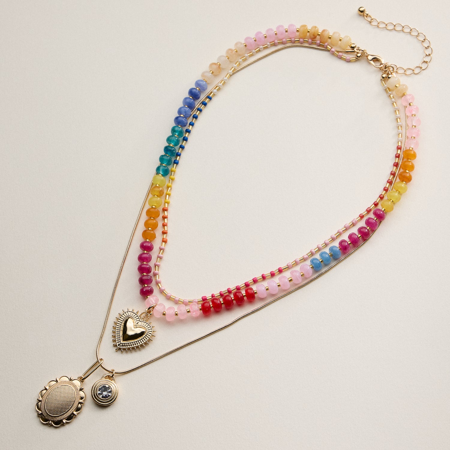 Layered Beaded and Pendant Necklace Set with Gold Accents – Heart and Charm Detail