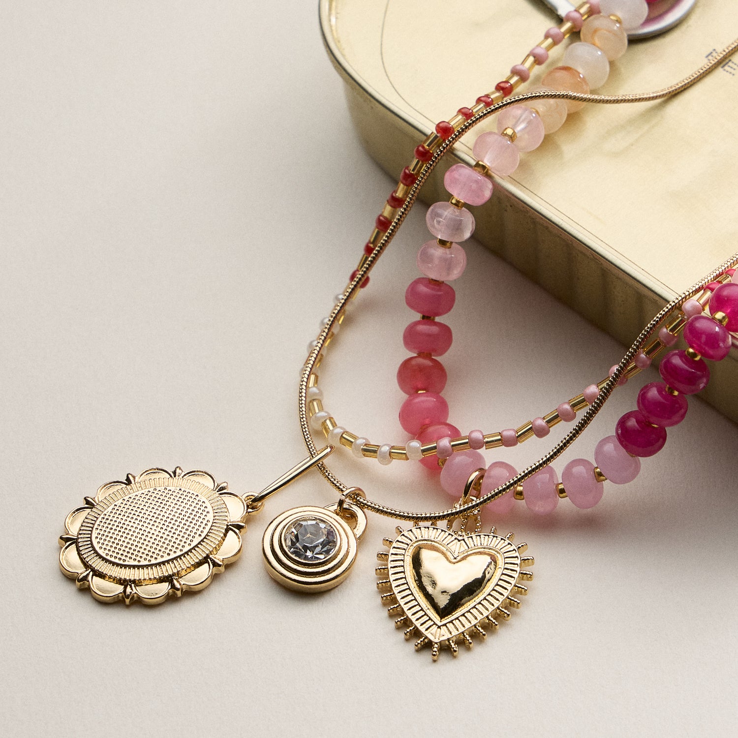 Layered Beaded and Pendant Necklace Set with Gold Accents – Heart and Charm Detail
