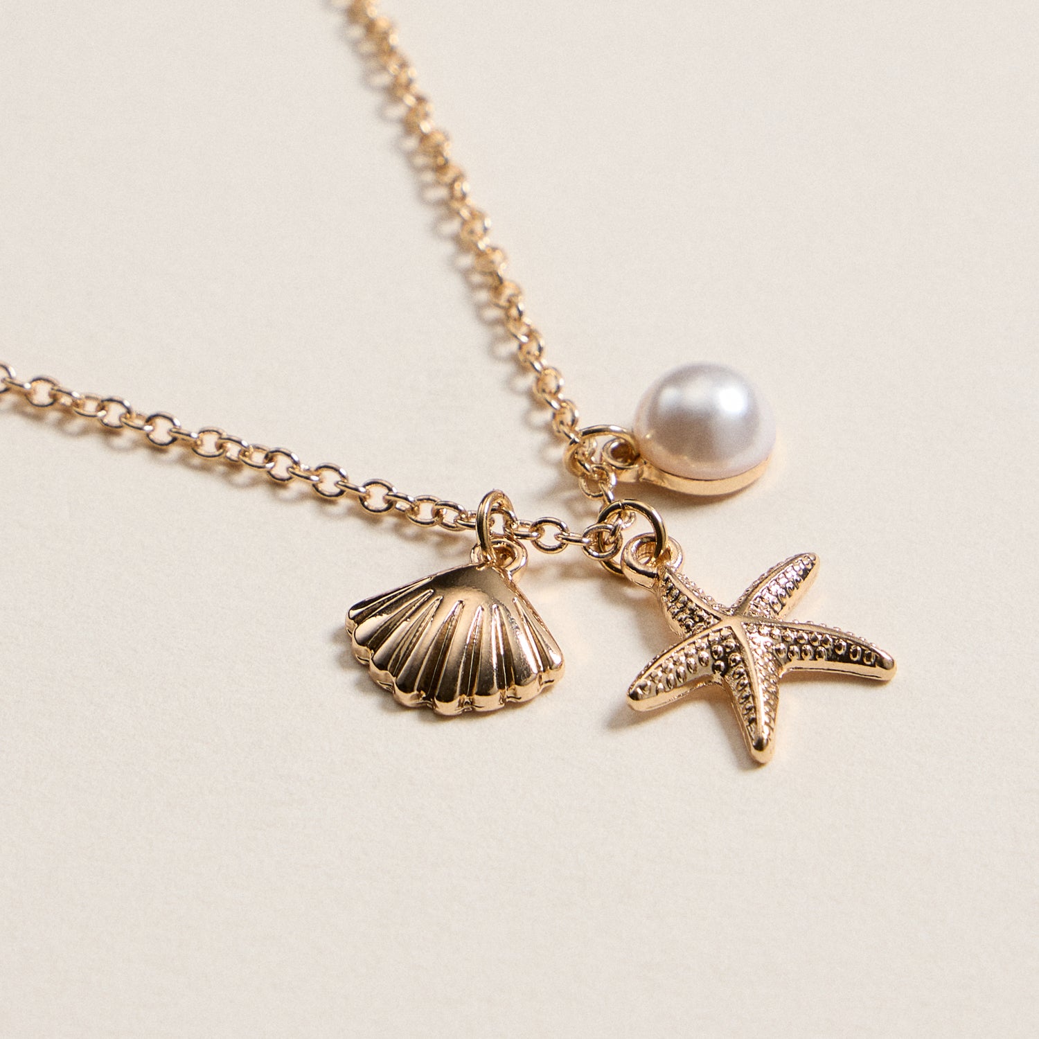 Seashell and Starfish Charm Necklace with Pearl