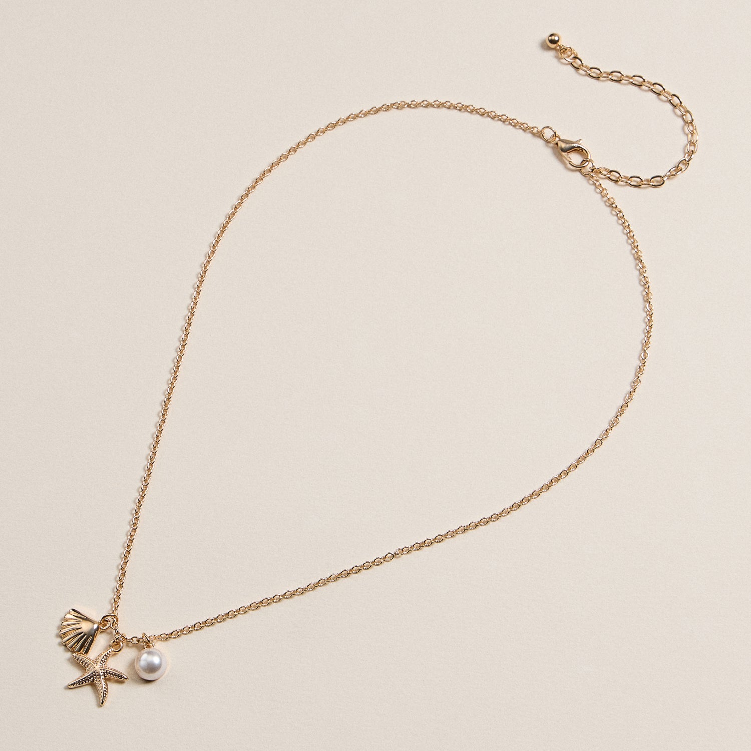 Coastal Charm Necklace with Starfish, Seashell & Pearl Accents