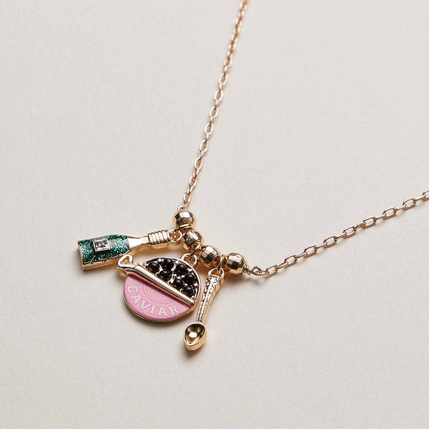 Gold Plated Playful Charm Necklace—Caviar Bottle Spoon