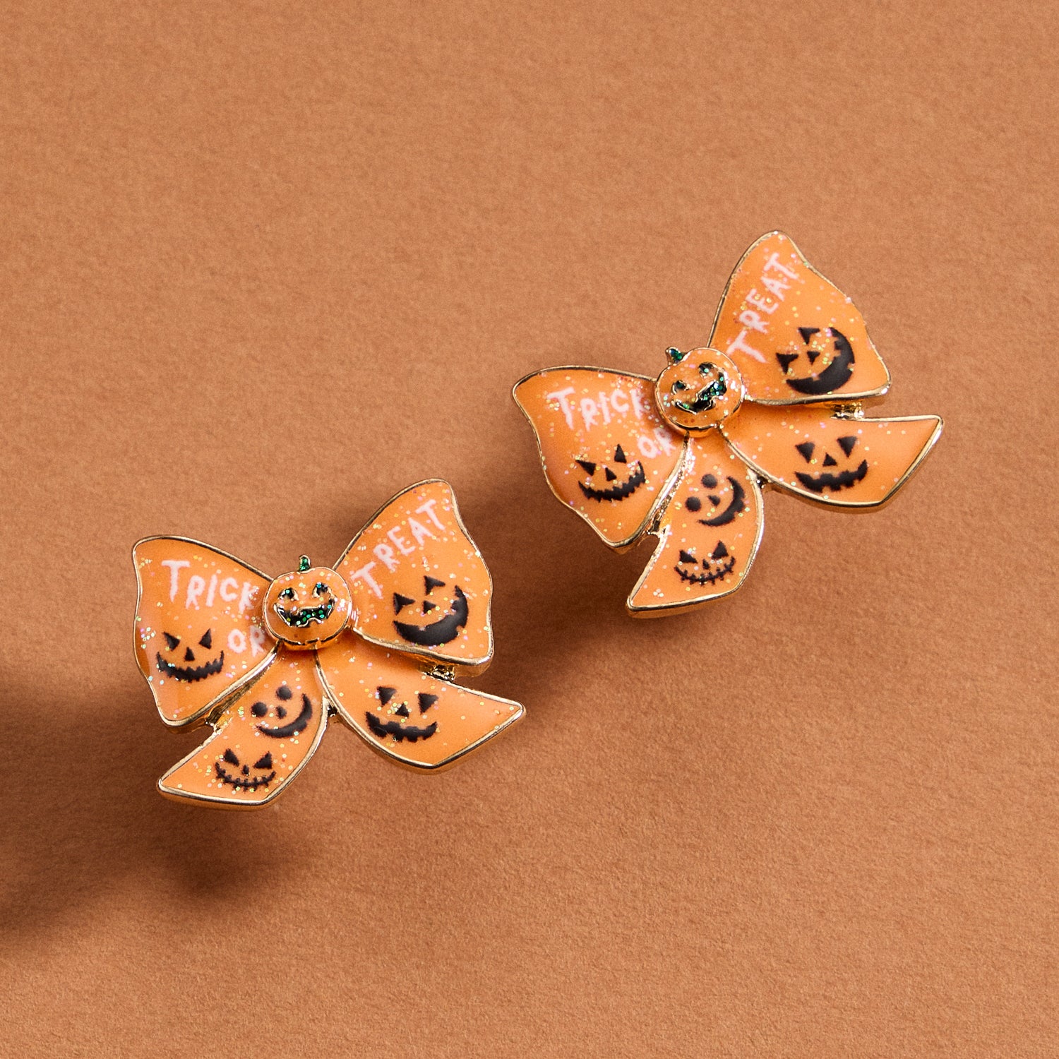 Enamel Pumpkin Stud Earrings with Delicate Bow Accent