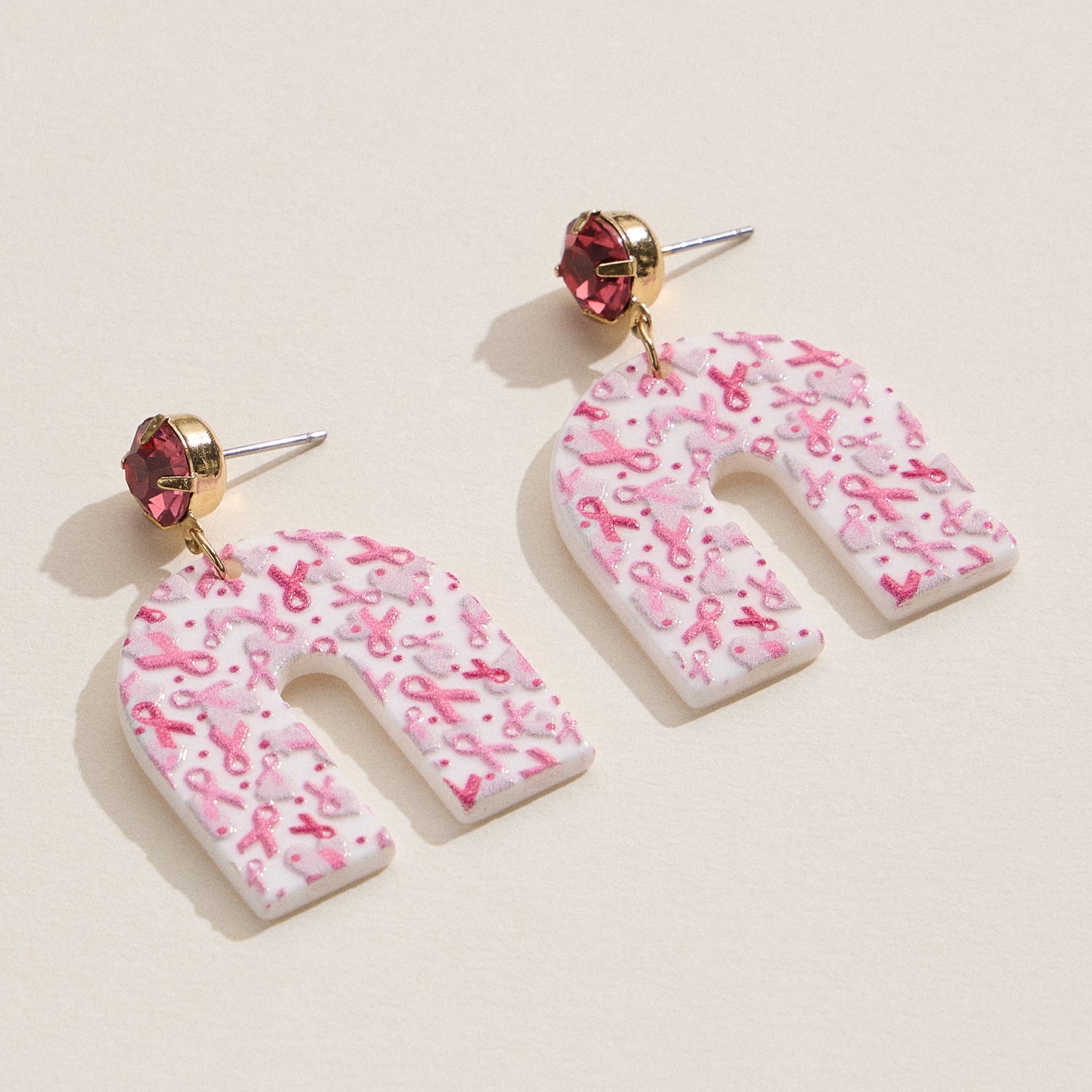 Acrylic Arch Earrings with Pink Ribbon Design
