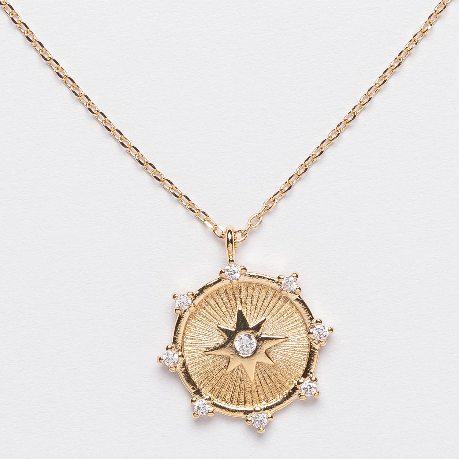 Gold Starburst Medallion Necklace with Crystals