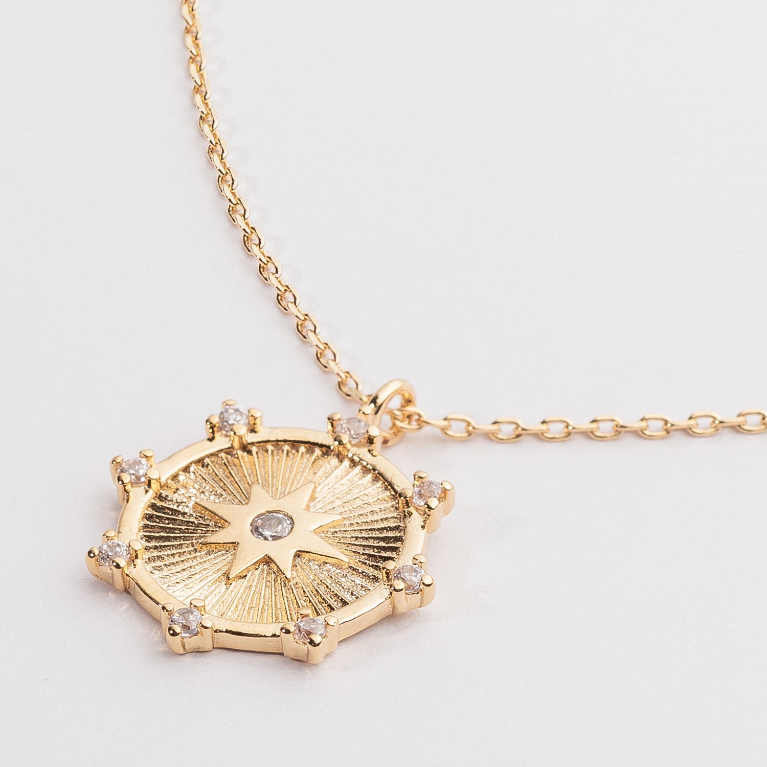 Gold Starburst Medallion Necklace with Crystals