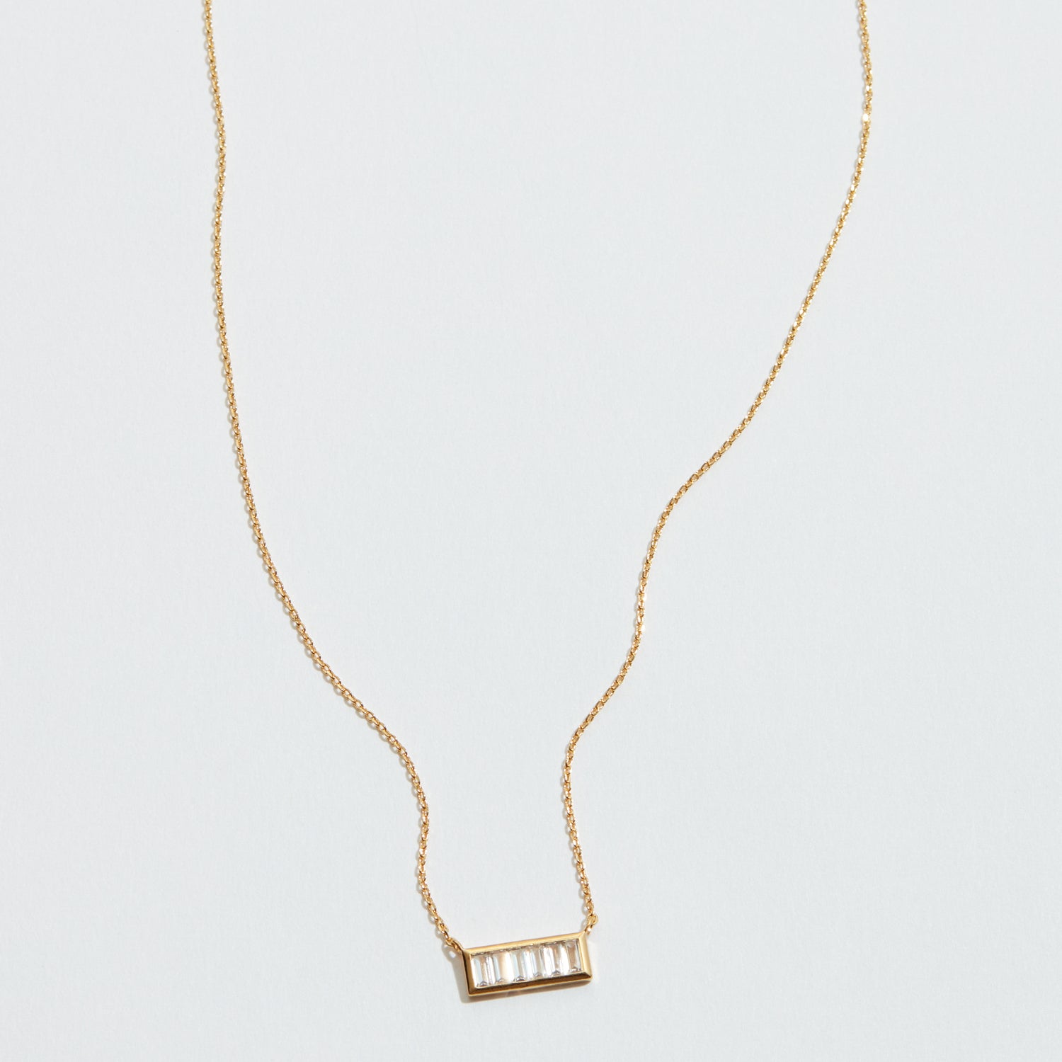 Gold Bar Pendant Necklace with Baguette Crystals