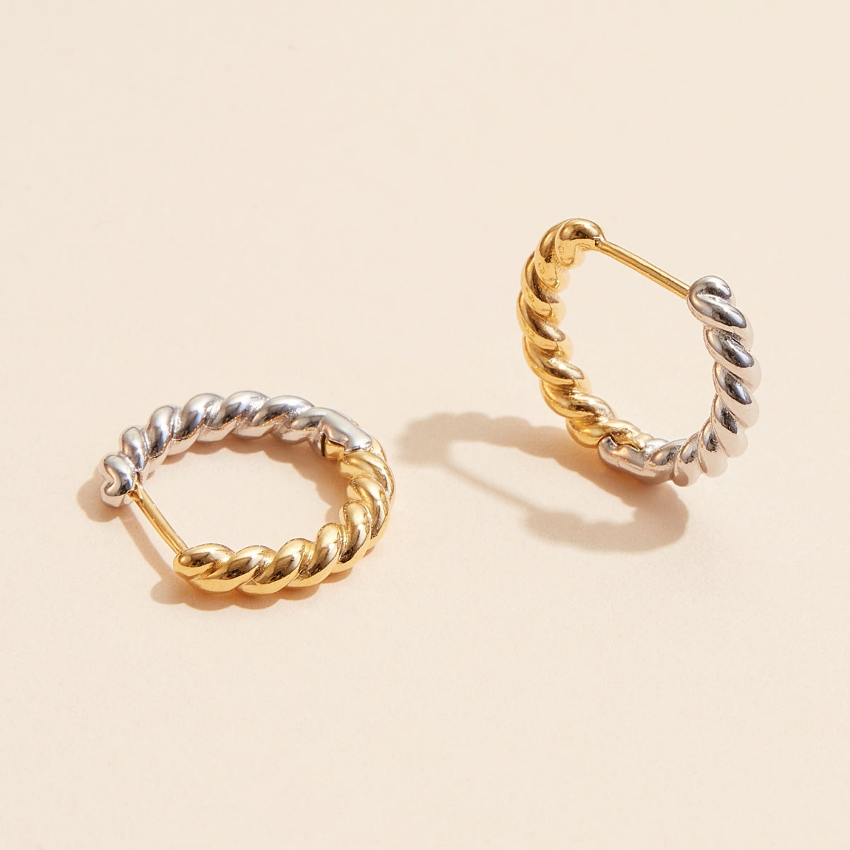 GOLD AND SILVER HOOP EARRING