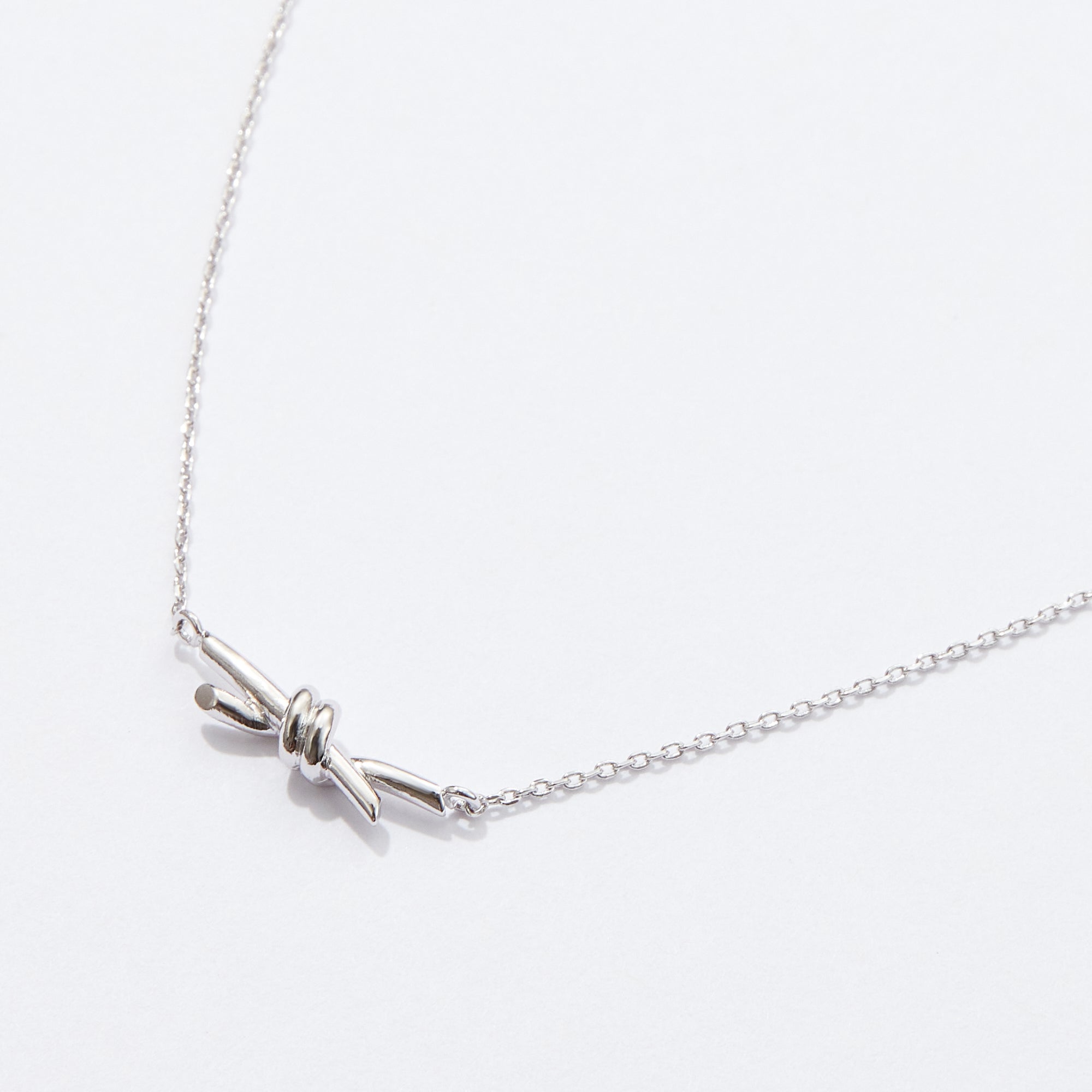 Gold Dipped Knot Pendant Necklace
