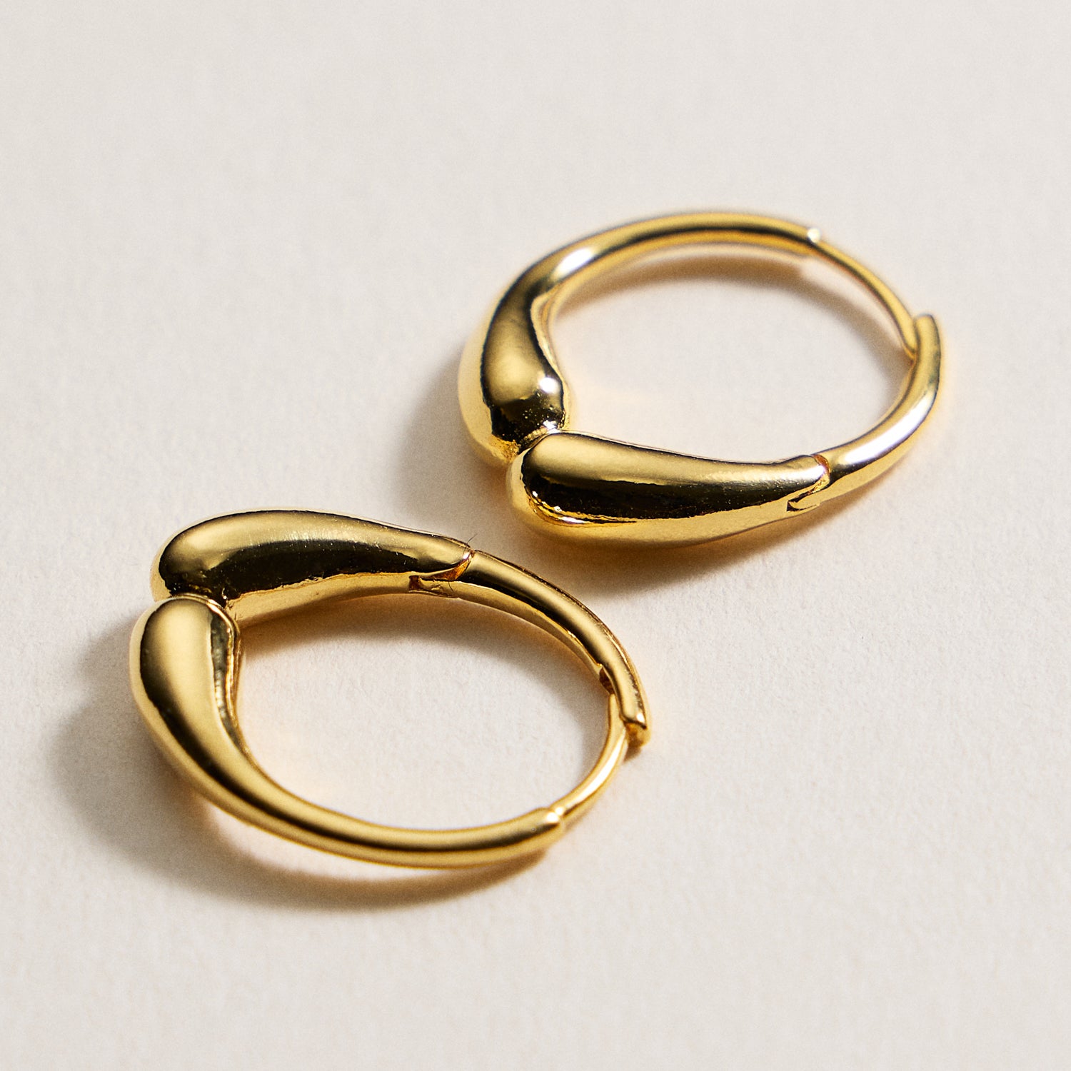 Gold-Dipped Organic Hoop Earrings – Modern Fluid Design
