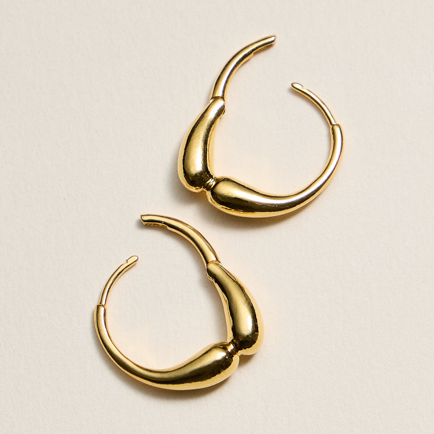 Gold-Dipped Organic Hoop Earrings – Modern Fluid Design