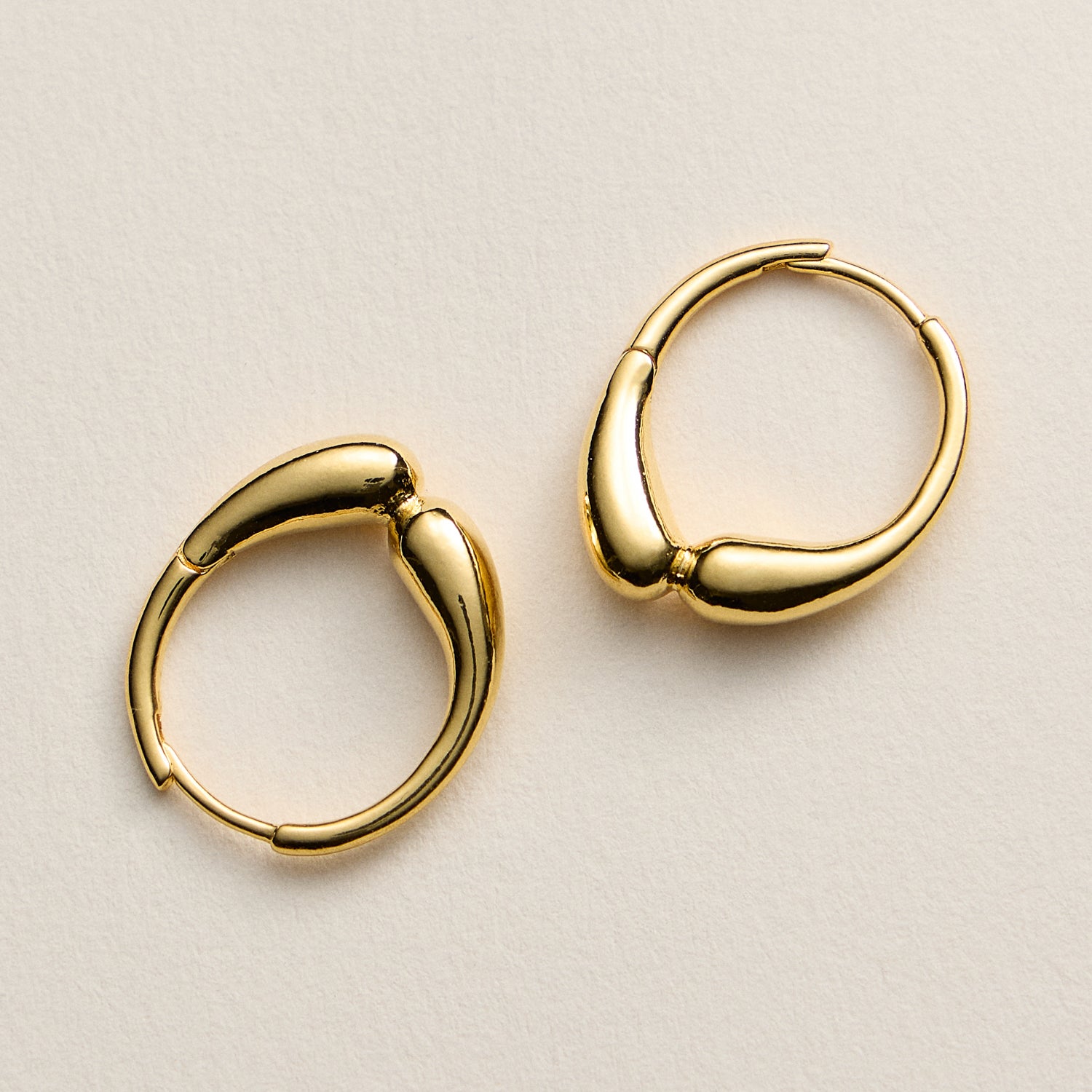 Gold-Dipped Organic Hoop Earrings – Modern Fluid Design