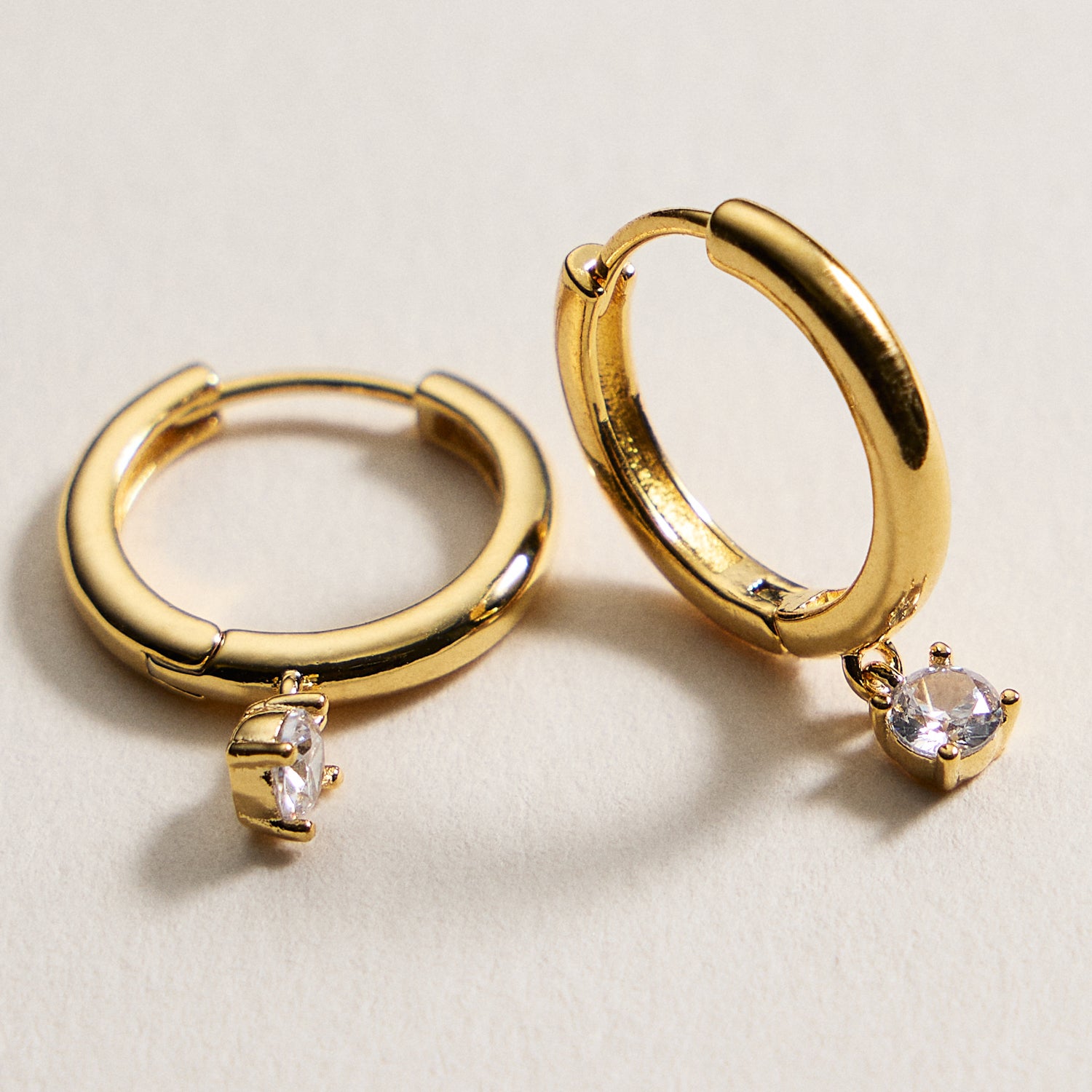 Gold Huggie Hoop Earrings with CZ Charm