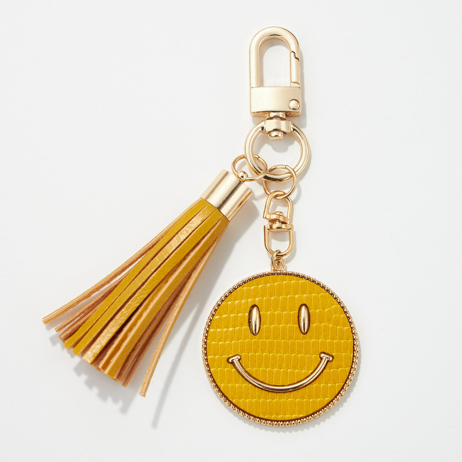LEATHER KEYCHAIN WITH TASSEL/SMILE - Frem