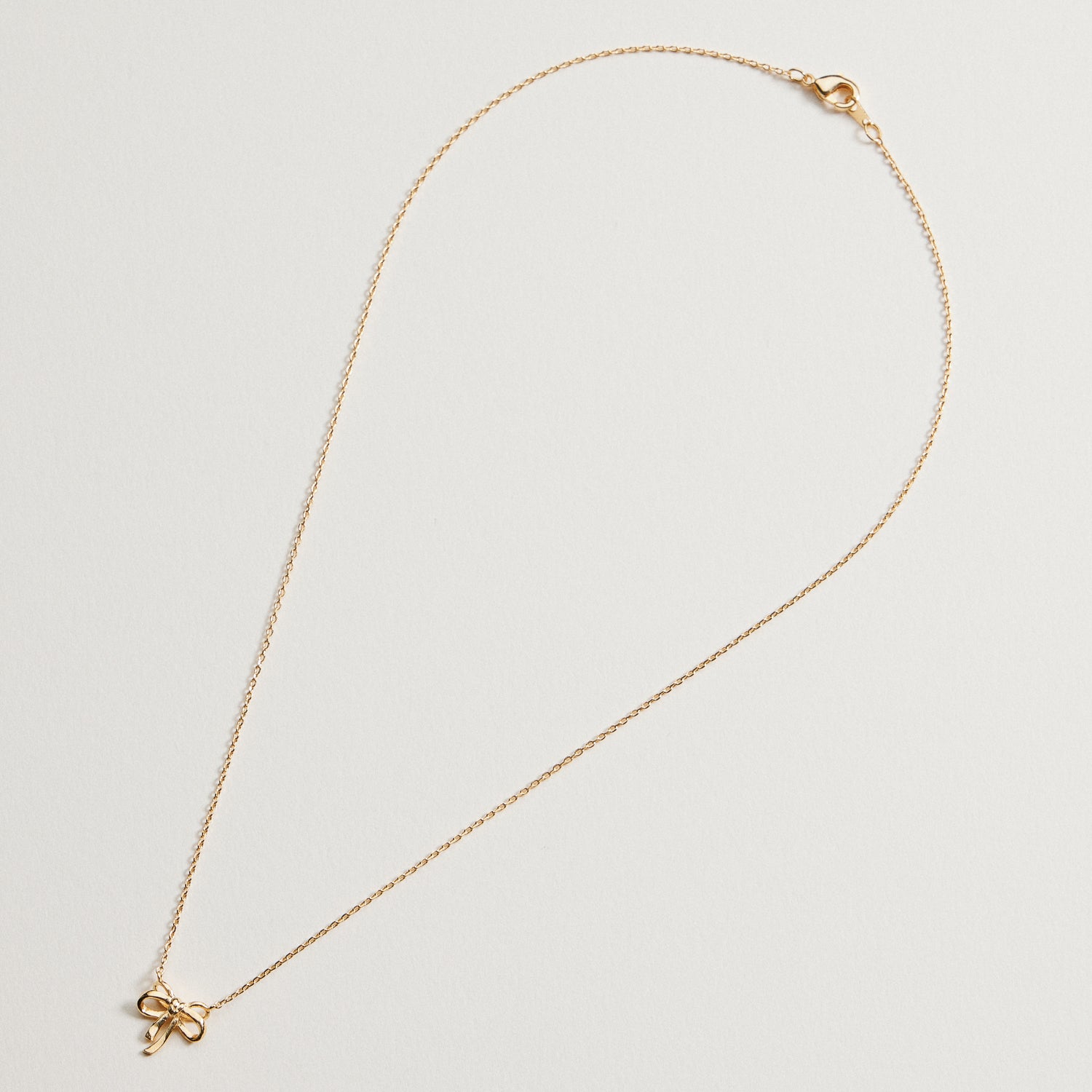 Gold Dainty Bow Pendant | Necklace